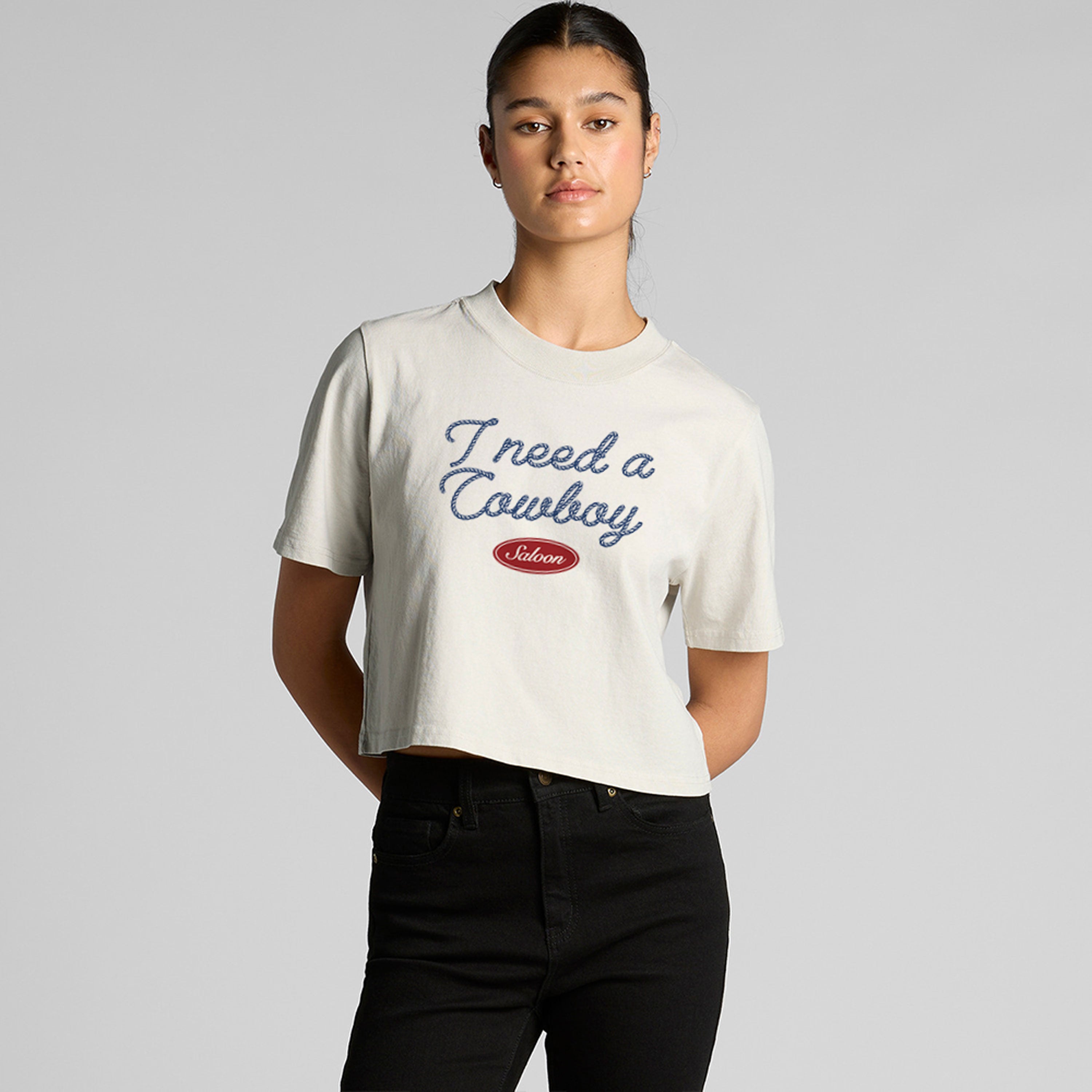 I NEED A COWBOY - WOMEN'S CROP TEE
